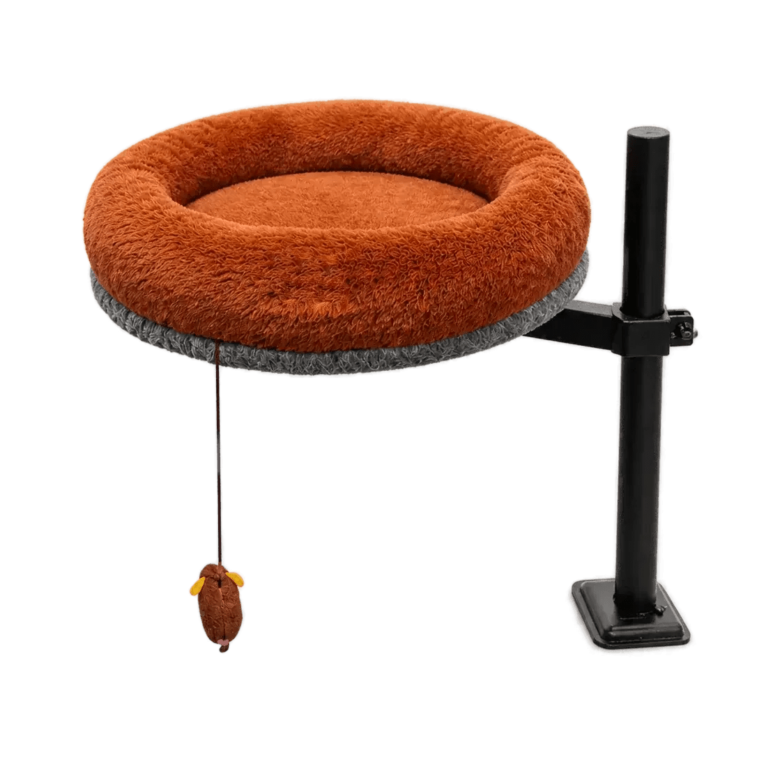 Side view of adjustable Petyze cat desk bed with plush brown donut cushion and hanging mouse toy.
