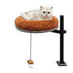 Silver and white tabby lounging in the Petyze raised cat desk bed with plush rust-brown donut cushion.