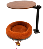 Modern cat desk bed with plush brown donut cushion under a round wooden tabletop, featuring a front mouse toy.